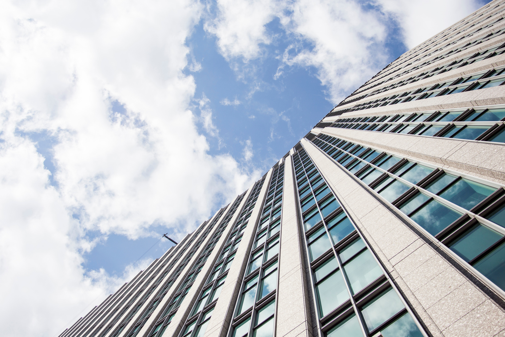 Modern building with glass to the blue sky